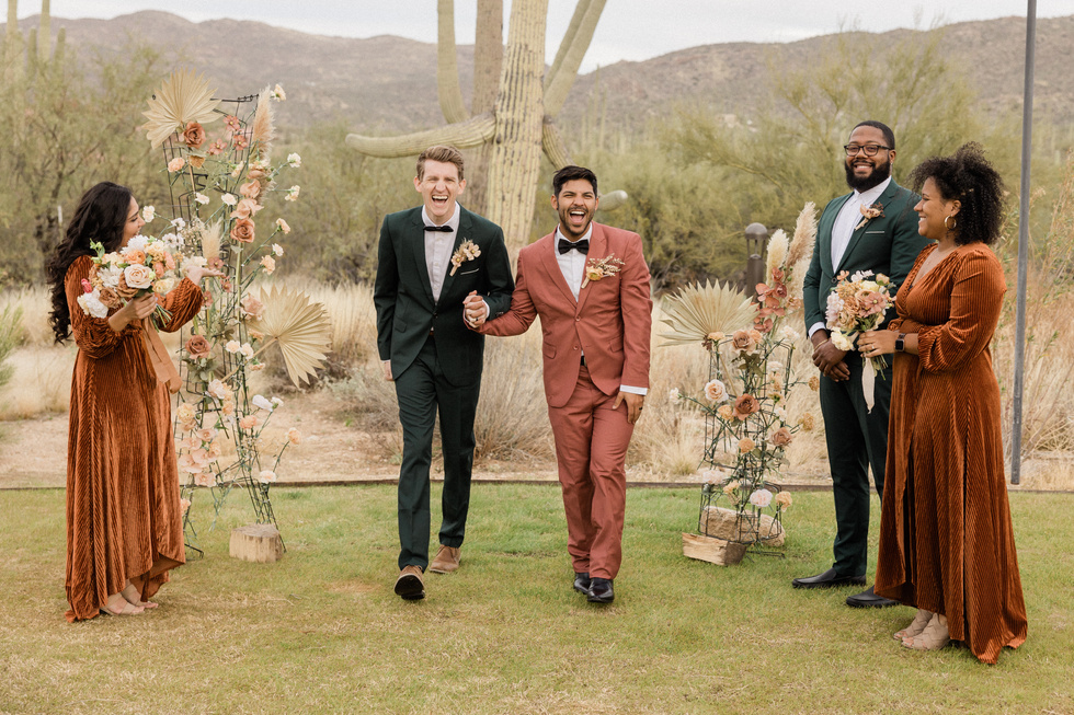 Newlywed Couple at Outdoor Rustic Wedding with Guests